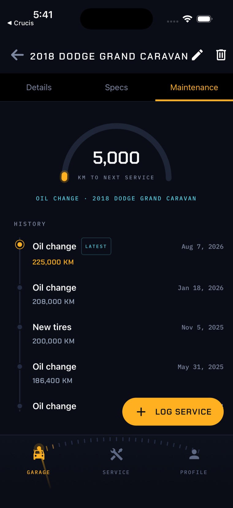 The MyCar Logs maintenance screen for a 2018 Dodge Grand Caravan, showing a gauge counting down 5,000 km to the next oil change above a dated service history.